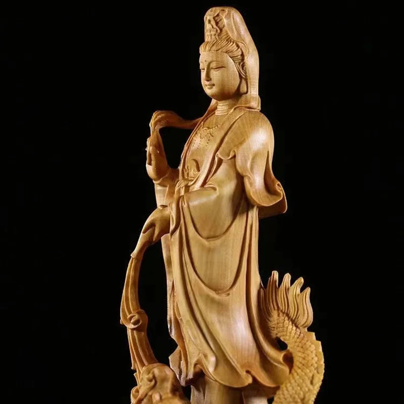 Guan Yin buddhistische Statue und Holzdrache
