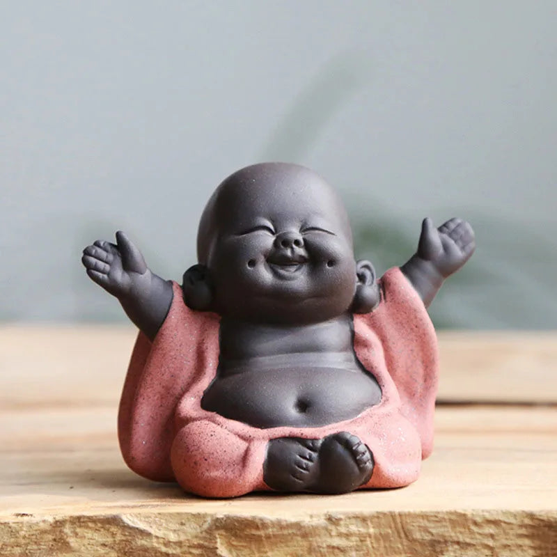 Lachende Baby-Buddha-Statuette